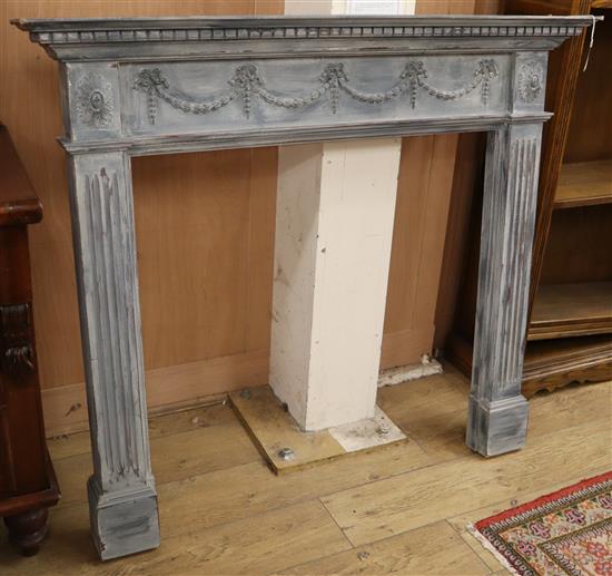 An Adam Design painted fire surround W.133cm